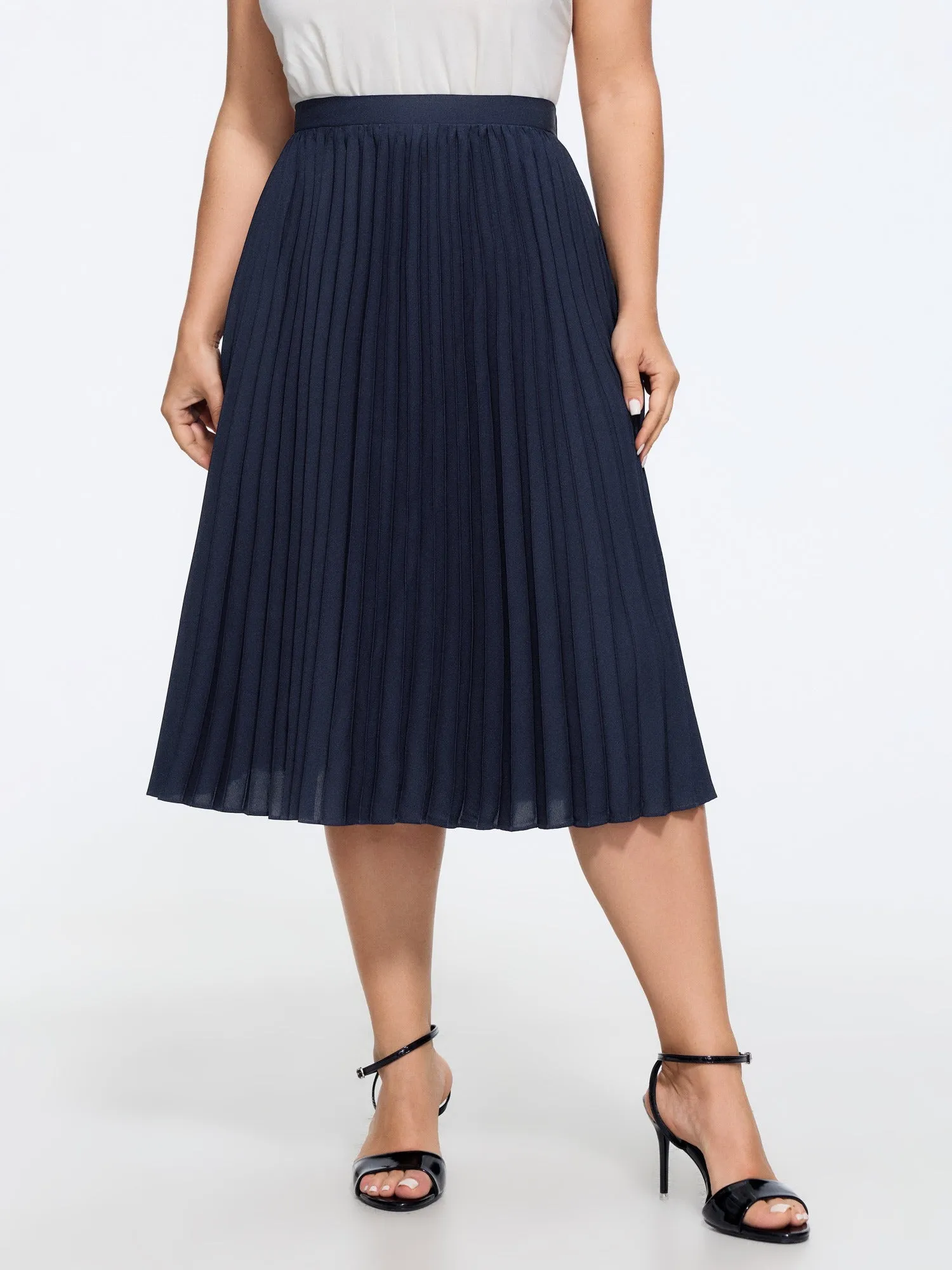 Solid Pleated Flowy Midi Skirt sold by Bloomchic
