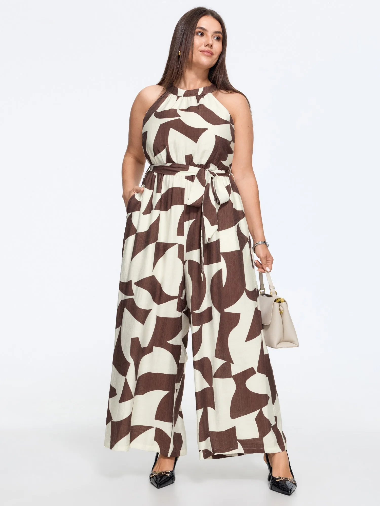 Geometric Print Halter Neck Tie Waist Wide Leg Jumpsuit sold by Bloomchic product image thumbnail 4