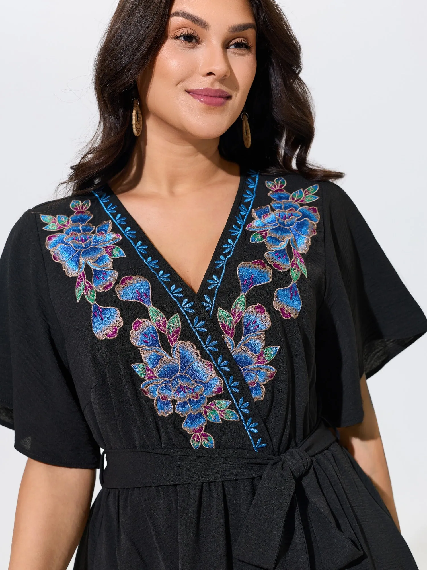 Floral Embroidery Wrap Style Belted Mini Dress sold by Bloomchic product image thumbnail 2