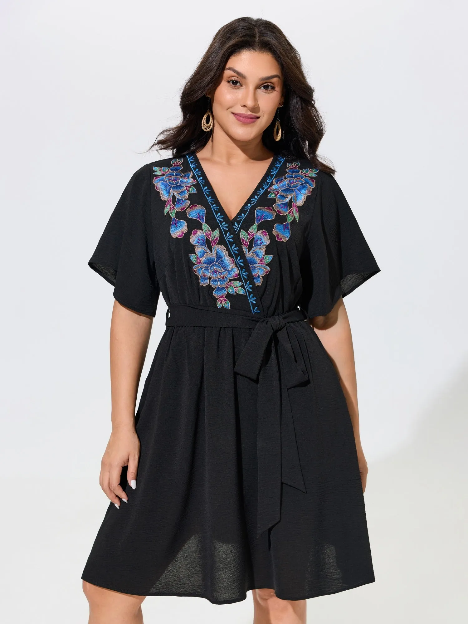 Floral Embroidery Wrap Style Belted Mini Dress sold by Bloomchic
