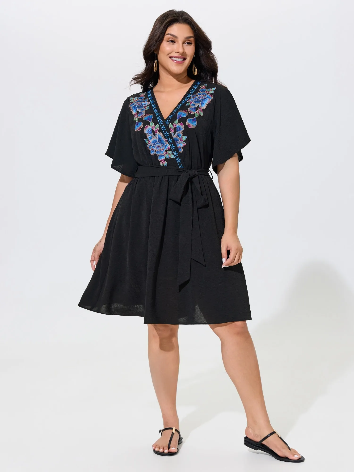 Floral Embroidery Wrap Style Belted Mini Dress sold by Bloomchic product image thumbnail 4