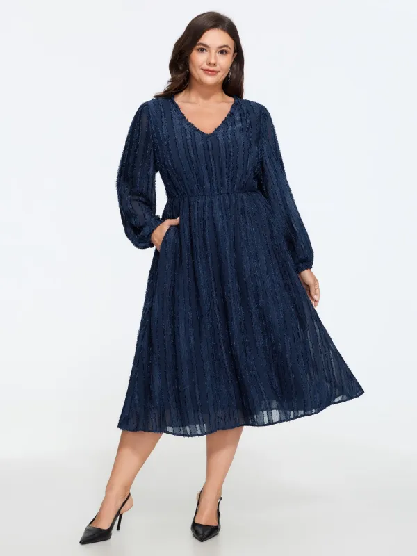 Textured V Neck Pocket Long Sleeve Midi Dress made by Bloomchic