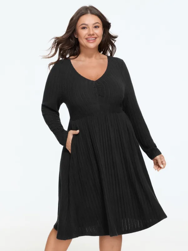 Solid V Neck Ribbed Knit Mini Dress made by Bloomchic