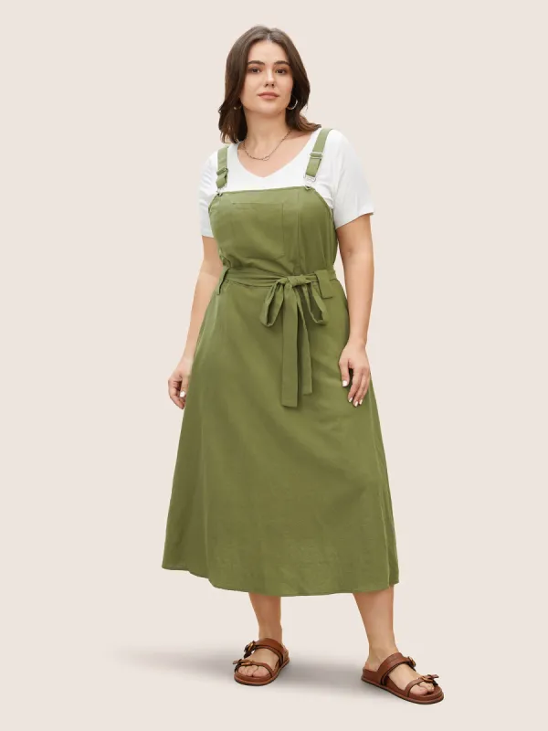 Solid Patched Pocket Adjustable Straps Belted Dress sold by Bloomchic