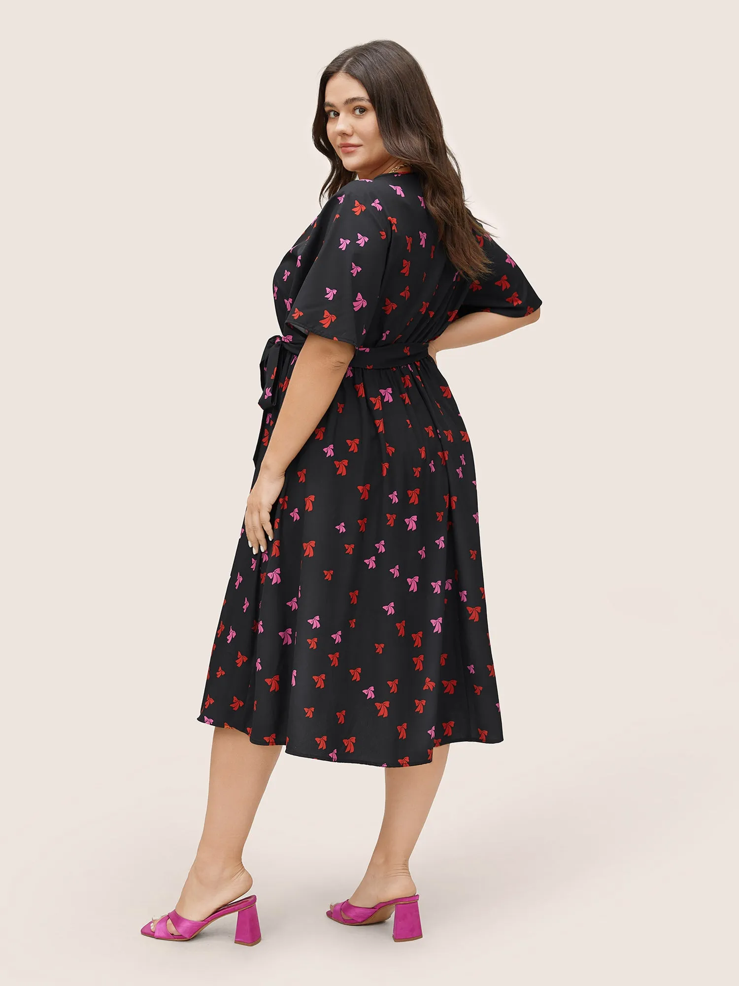 Bowknot Overlap Collar Pocket Belted Dress sold by Bloomchic product image thumbnail 3