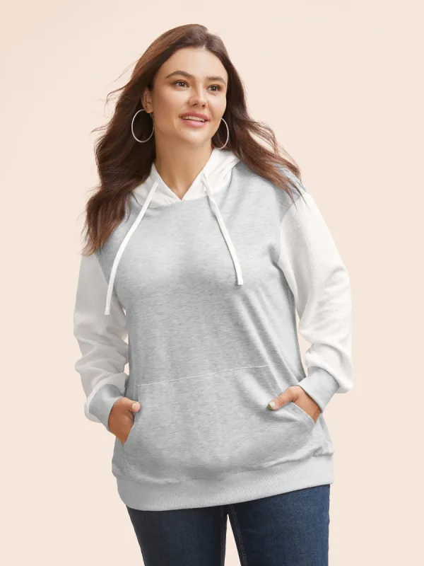 Contrast Patchwork Pocket Hooded Drawstring Sweatshirt sold by Bloomchic