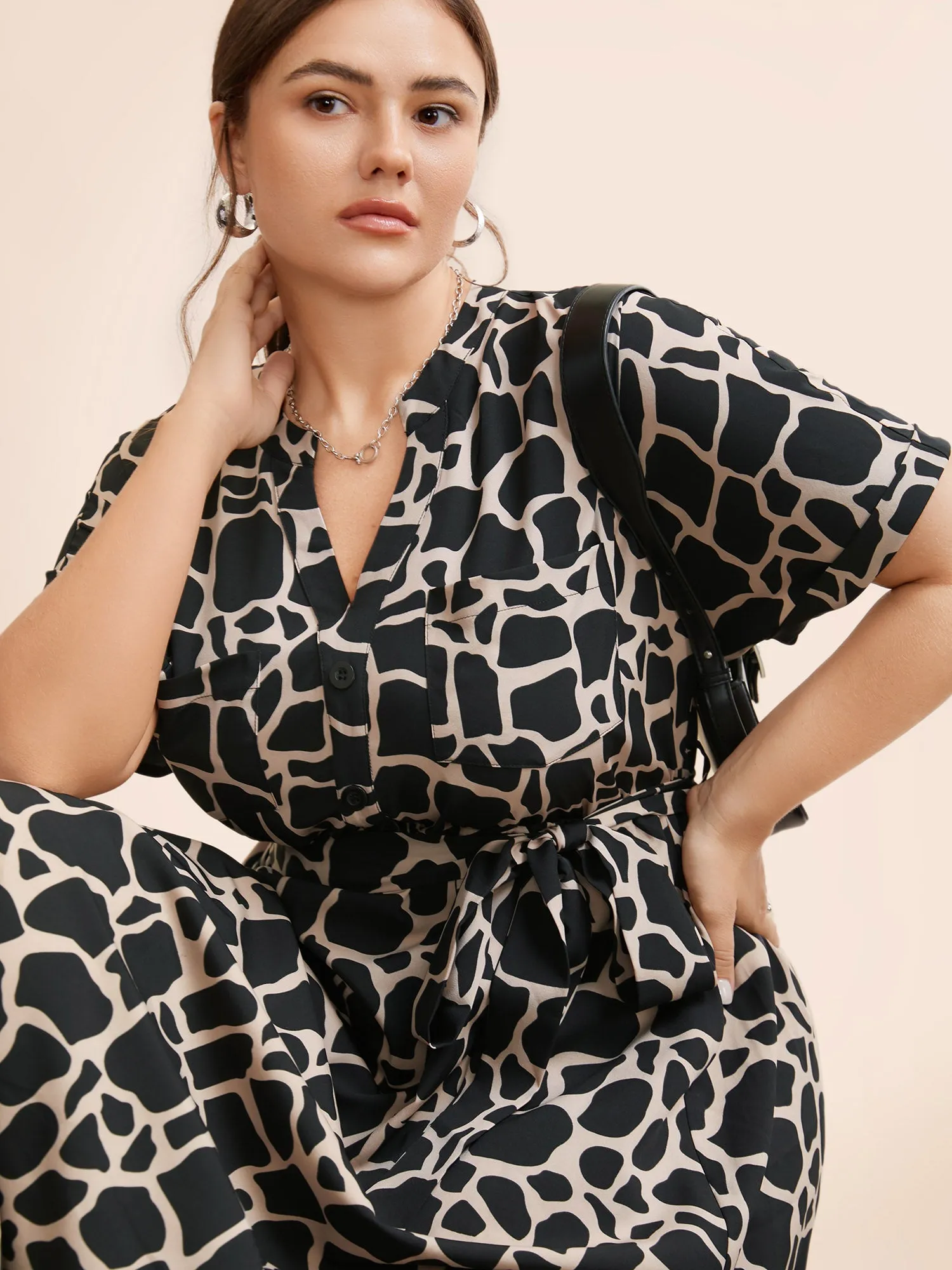 Geometric Notched Patched Pocket Belted Dress sold by Bloomchic product image thumbnail 2