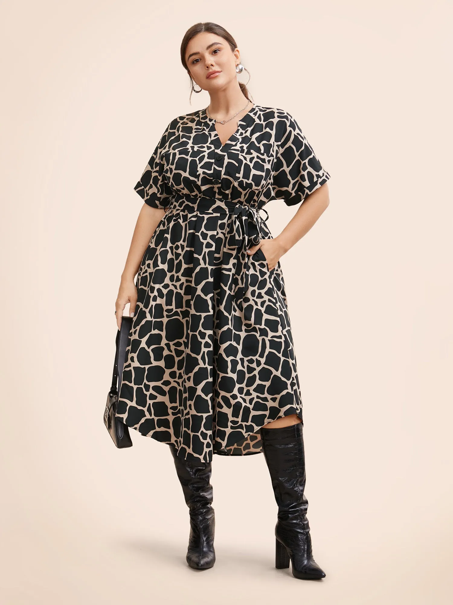 Geometric Notched Patched Pocket Belted Dress sold by Bloomchic