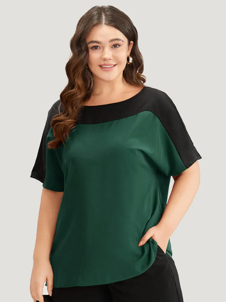 Anti-Wrinkle Two Tone Dolman Sleeve Woven Top sold by Bloomchic