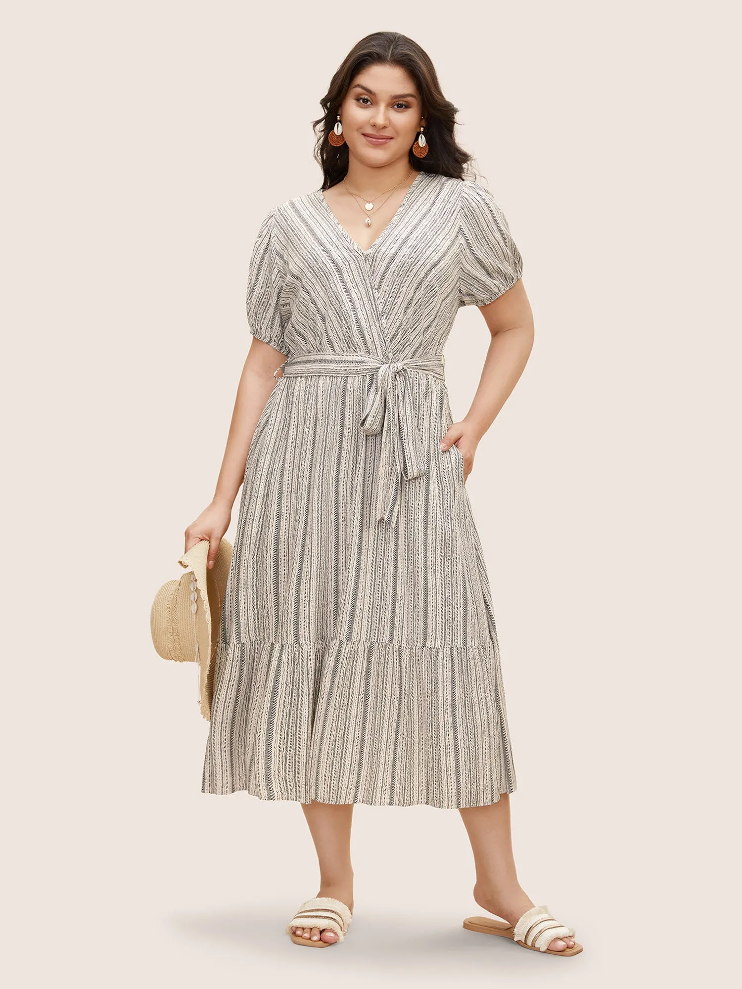 Striped Wrap Ruffle Hem Belted Dress sold by Bloomchic