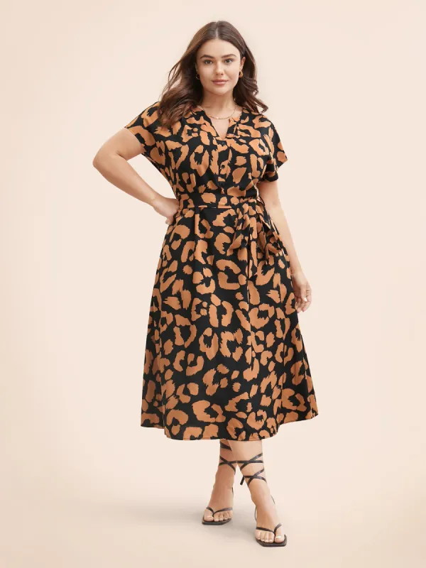 Leopard Print Notched Button Detail Dress sold by Bloomchic