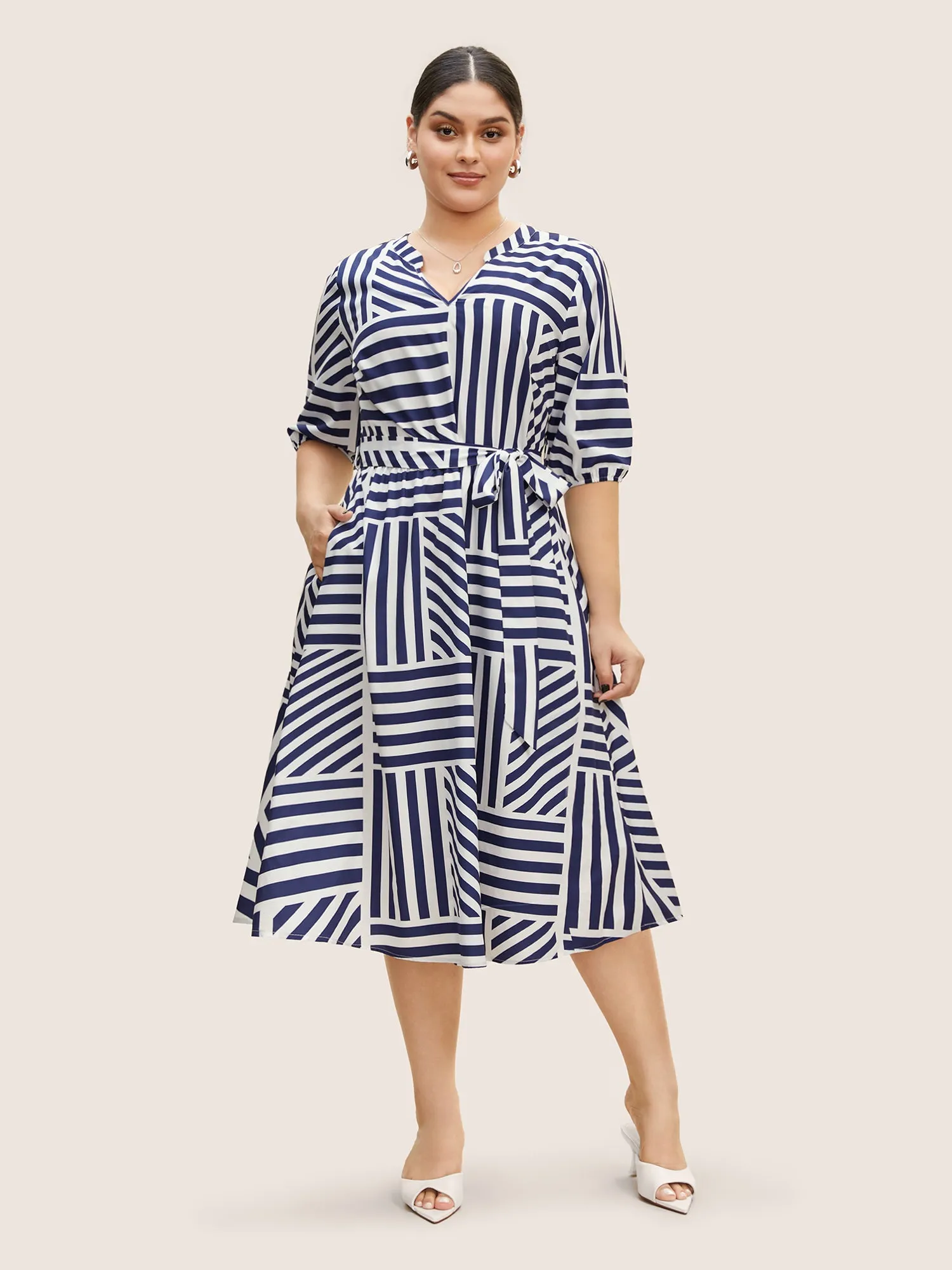 Striped Notched Collar Belted Midi Dress sold by Bloomchic