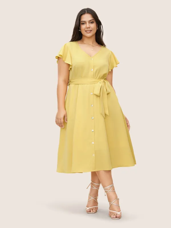 Citrus Solid Ruffle Cap Sleeve Button Detail Dress sold by Bloomchic