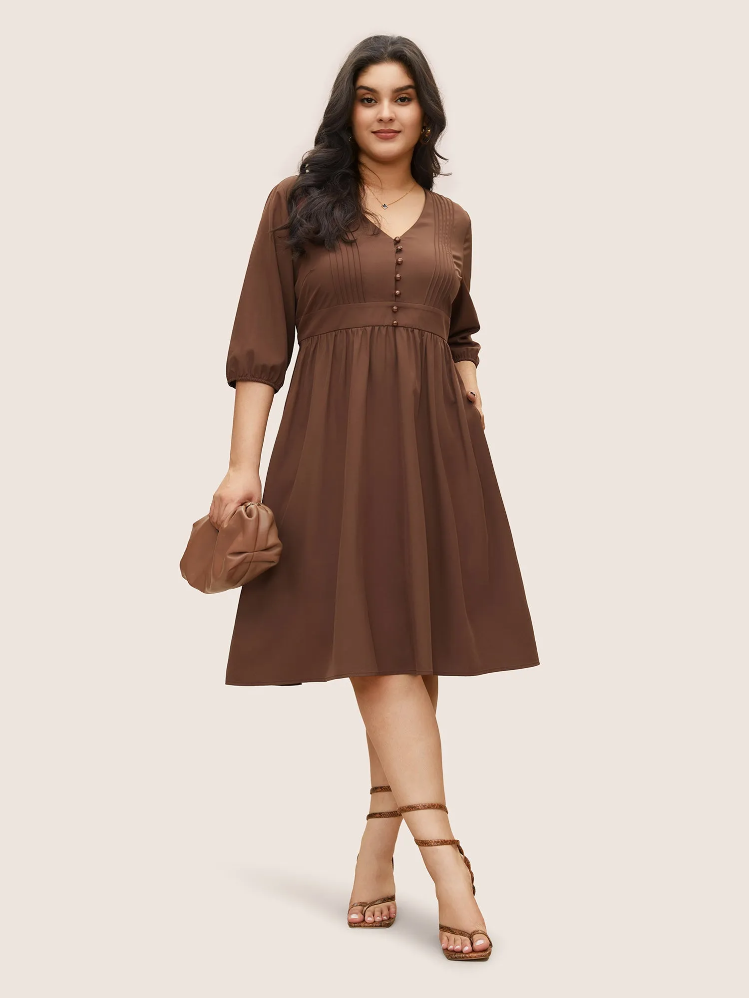 Solid Pleated Button Detail Lantern Sleeve Dress sold by Bloomchic