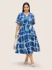 Geometric Print Notched Belted Button Up Dress sold by Bloomchic