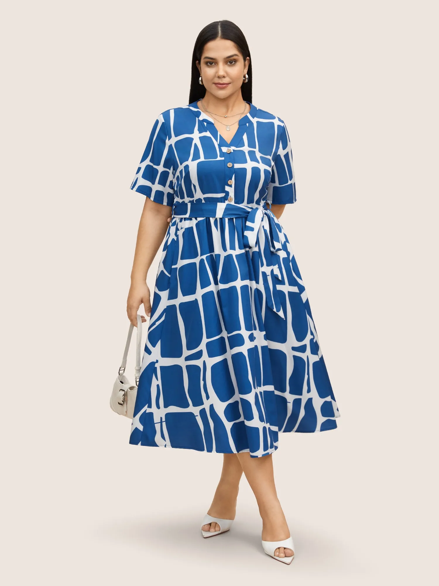Geometric Print Notched Belted Button Up Dress sold by Bloomchic