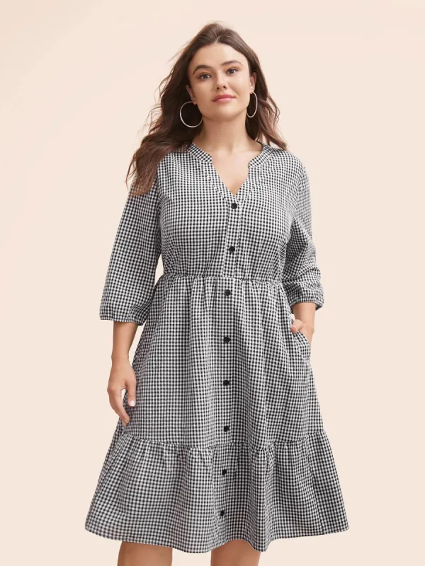 Gingham Notched Ruffle Hem Lantern Sleeve Dress sold by Bloomchic