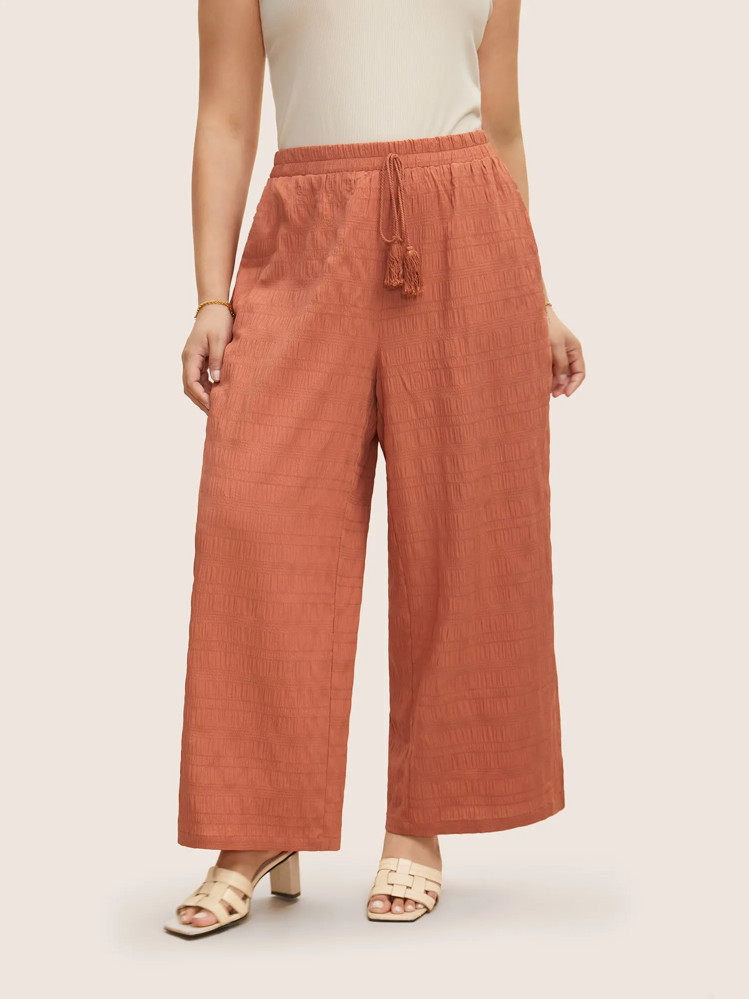 Solid Texture Slit Hem Drawstring Pants sold by Bloomchic