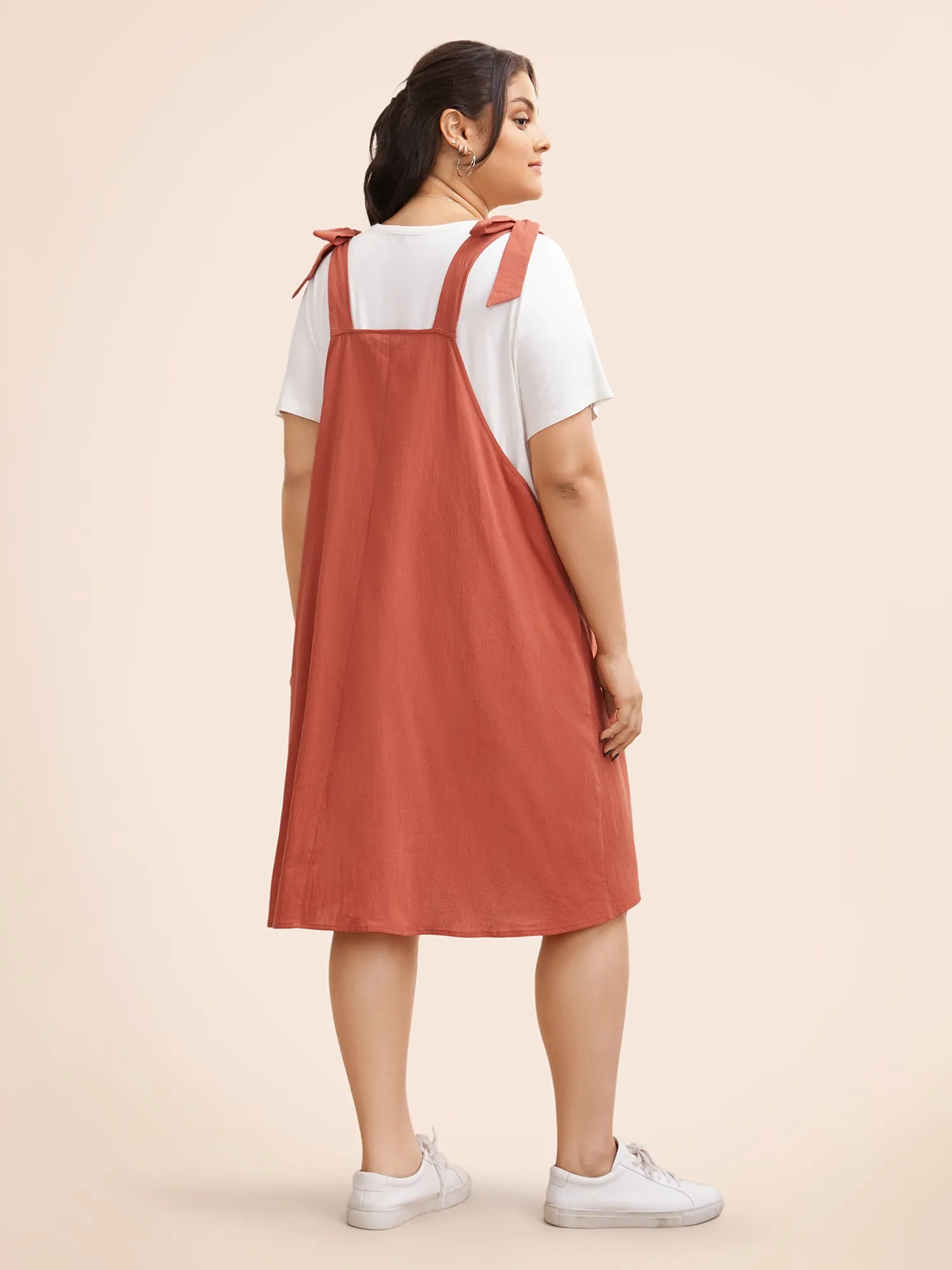 Solid Pleated Hem Pocket Tie Shoulder Overall Dress sold by Bloomchic product image thumbnail 4