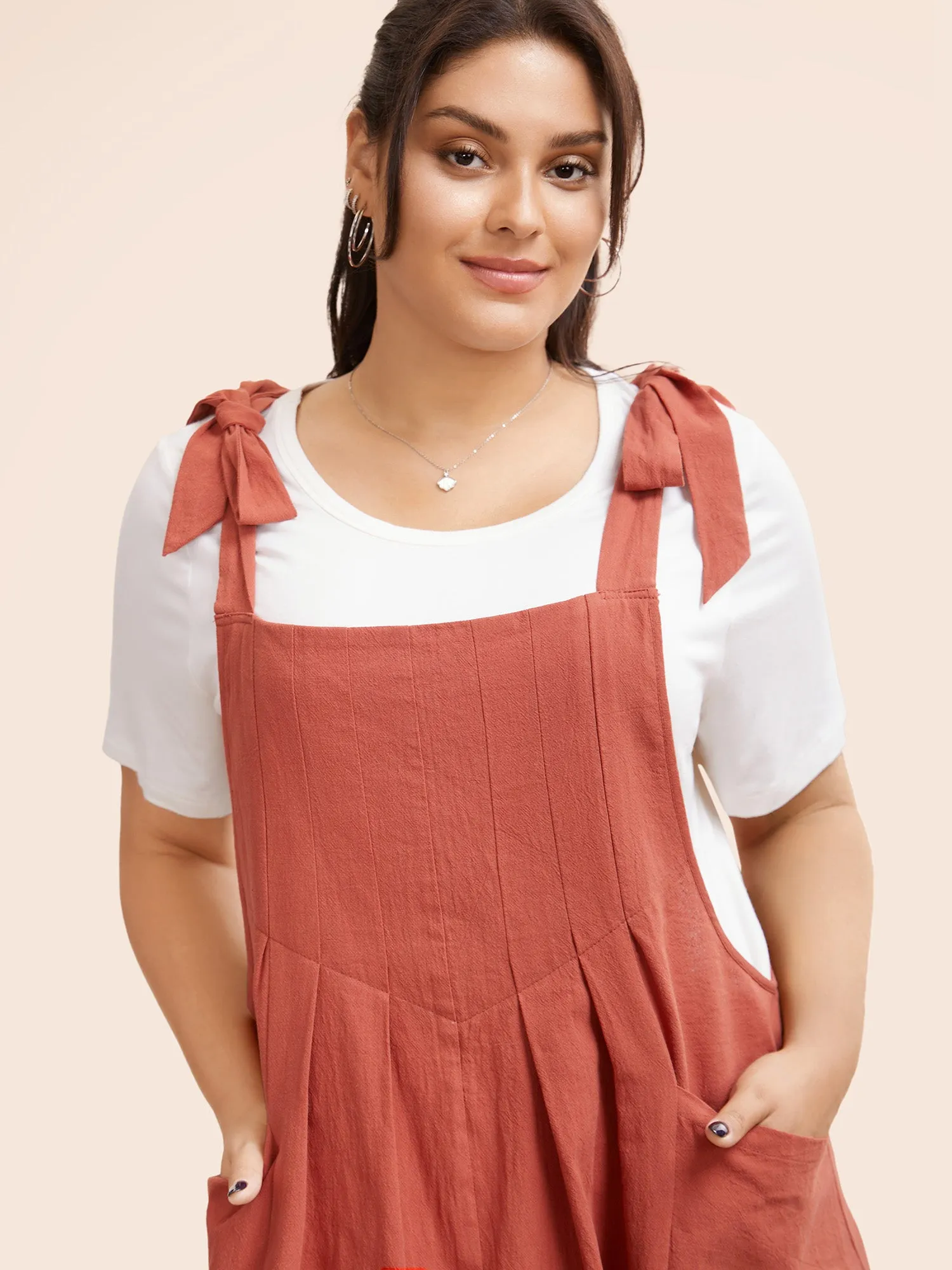 Solid Pleated Hem Pocket Tie Shoulder Overall Dress sold by Bloomchic product image thumbnail 2