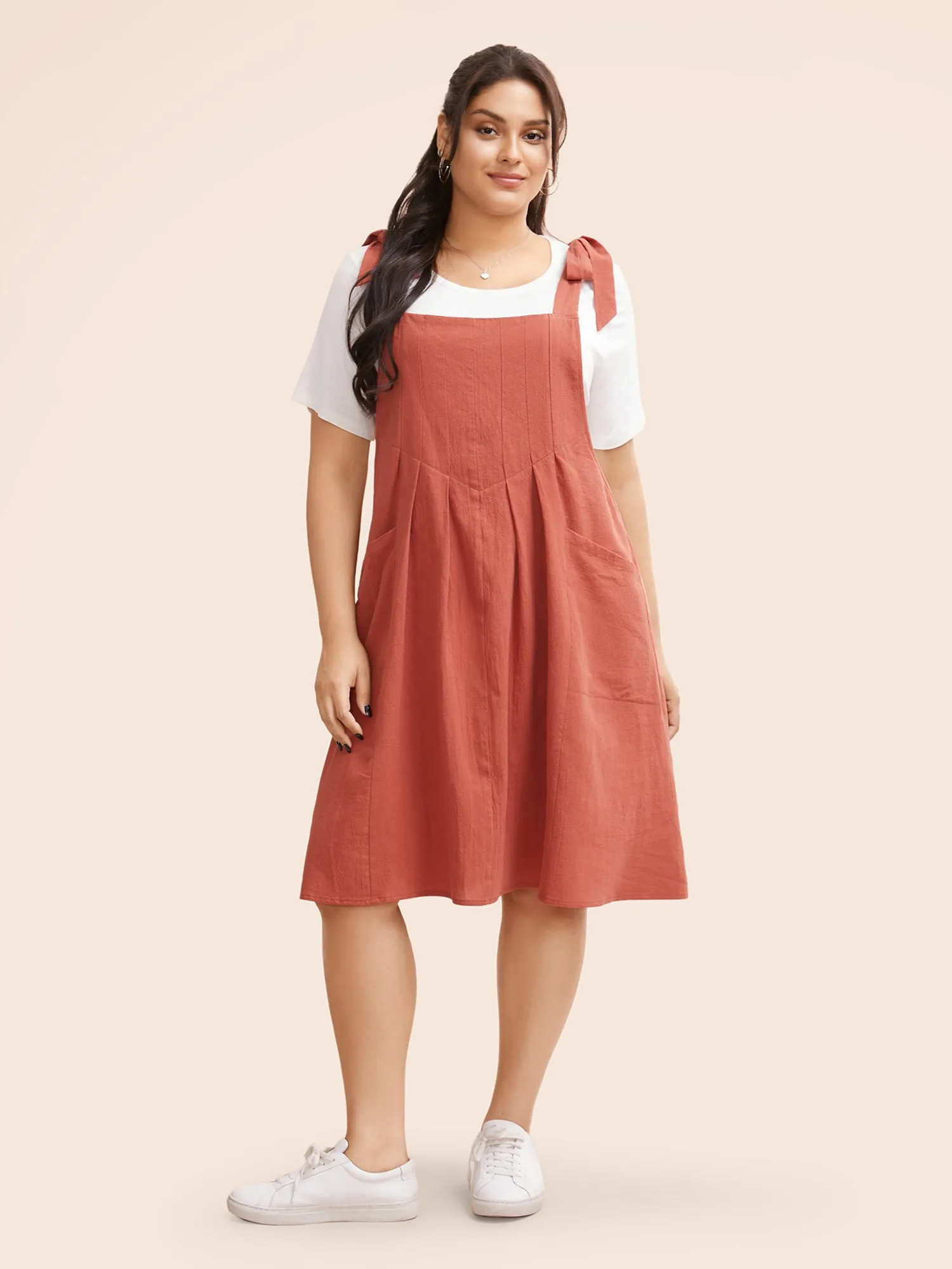 Solid Pleated Hem Pocket Tie Shoulder Overall Dress sold by Bloomchic