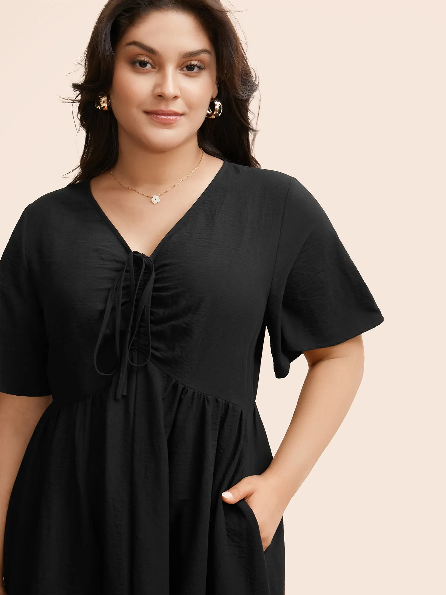 V Neck Drawstring Laser Cut Dress sold by Bloomchic product image thumbnail 3