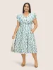 Allover Print Tiered Ruffle Cap Sleeve Dress sold by Bloomchic