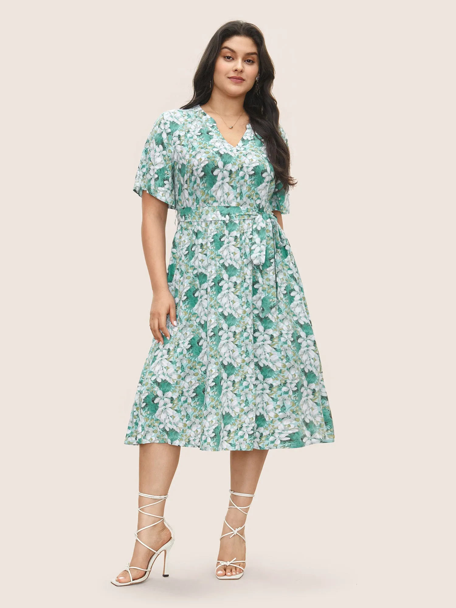 Floral Print Notched Belted Midi Dress sold by Bloomchic