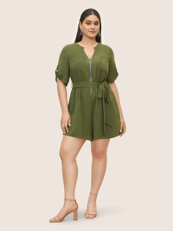 Solid Half Zip Belted Tab Sleeve Jumpsuit sold by Bloomchic