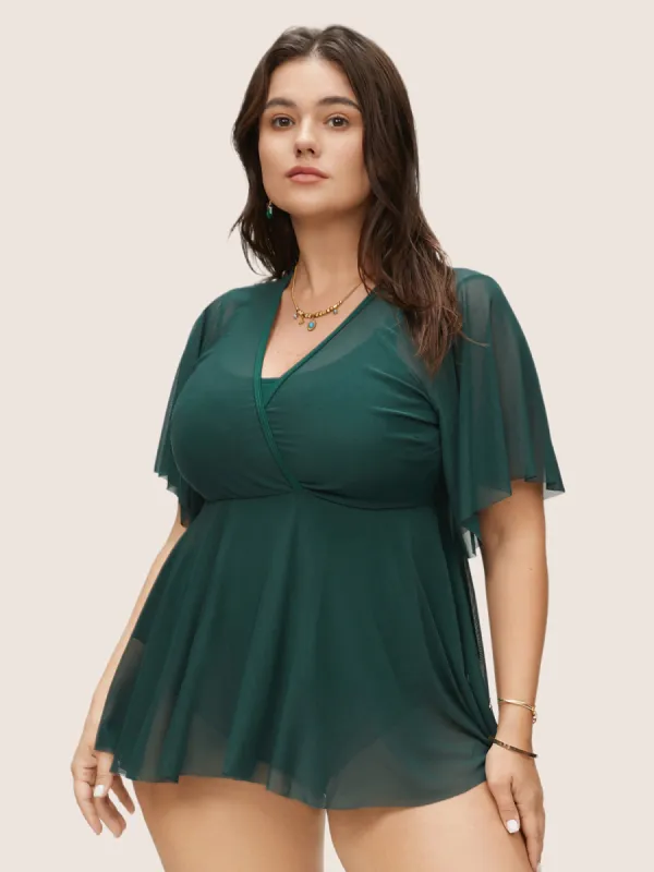 Plain Wrap Tiered Mesh Flutter Sleeve Swim Top sold by Bloomchic