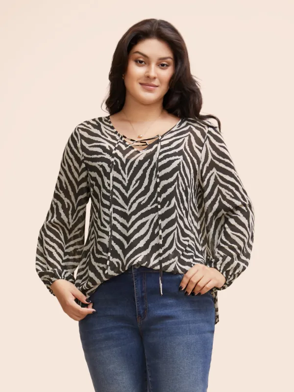 Zebra Print Lace Up Split Hem Blouse sold by Bloomchic