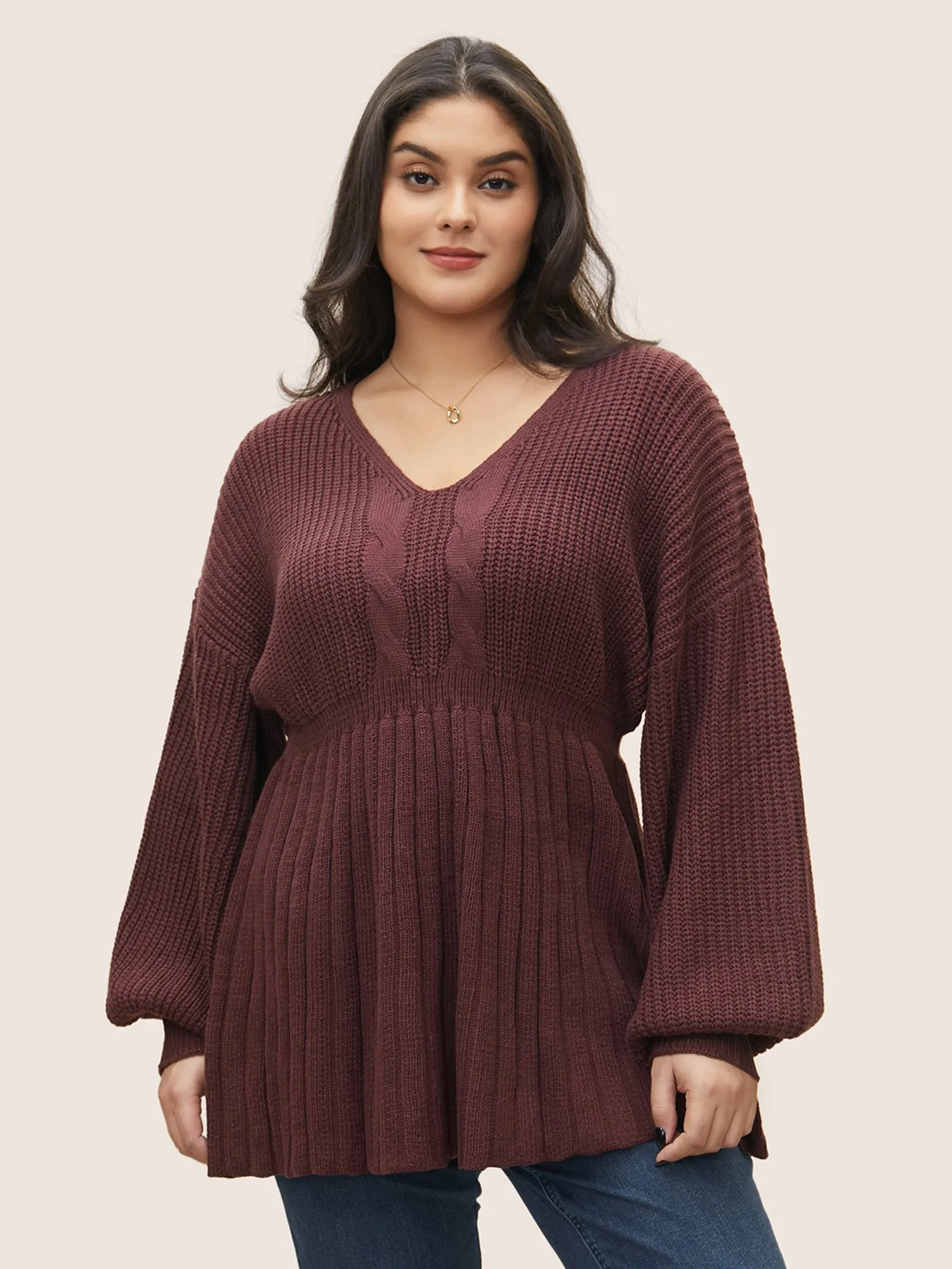 Solid Cable Knit Elastic Waist Pullover sold by Bloomchic