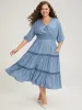 Solid Shirred Stitch Layered Hem Ties Dress sold by Bloomchic