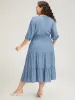 Solid Shirred Stitch Layered Hem Ties Dress sold by Bloomchic