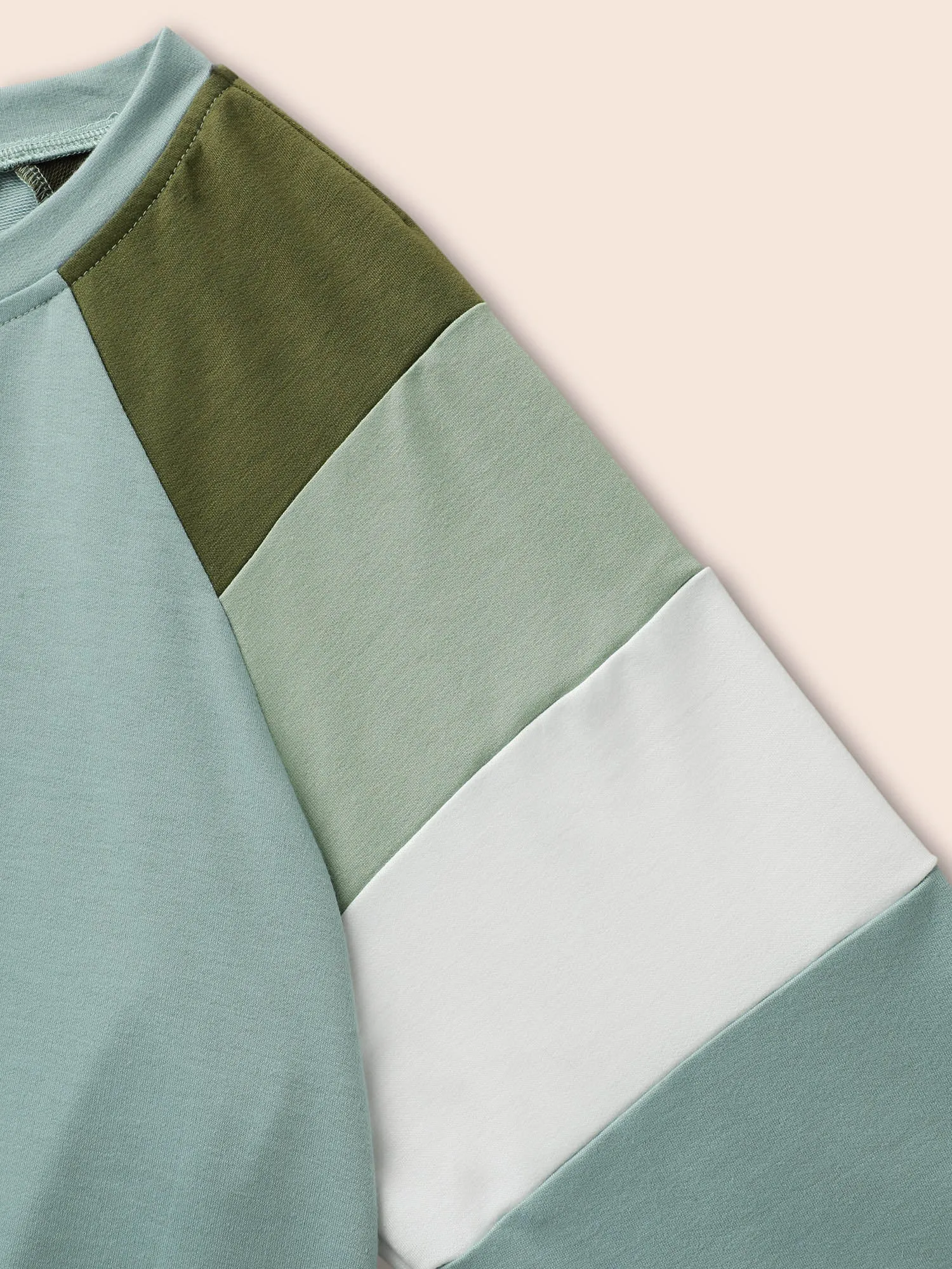 Contrast Patchwork Notched Raglan Sleeve Sweatshirt sold by Bloomchic product image thumbnail 5