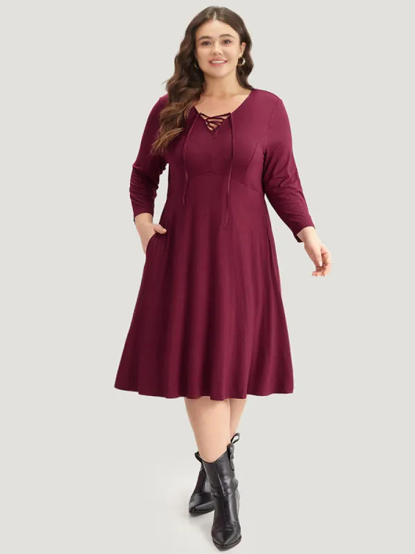 Supersoft Essentials Solid Lace Up Ruffle Hem Dress sold by Bloomchic