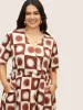 Sun Print Overlap Collar Elastic Waist Dress sold by Bloomchic