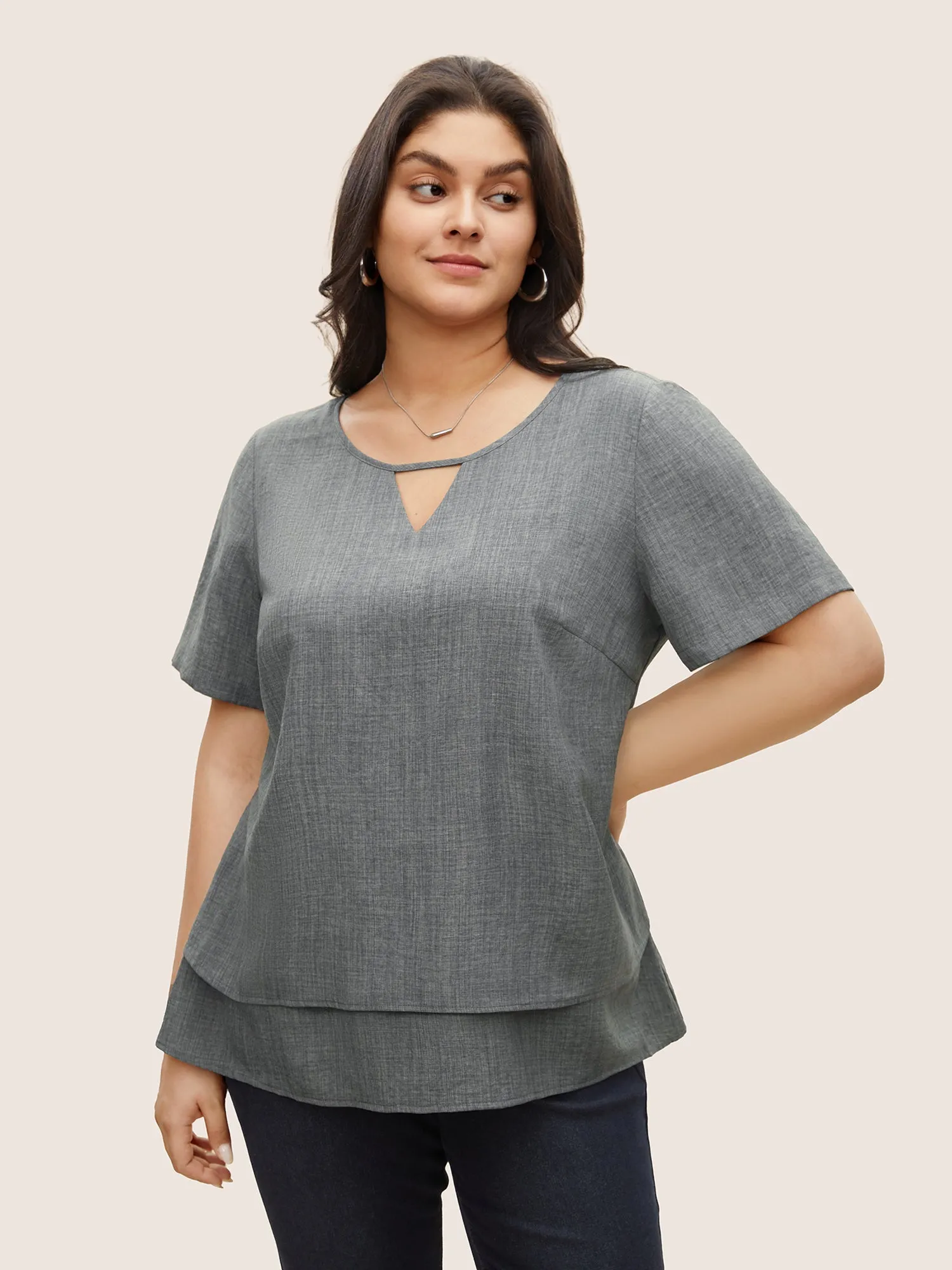 Keyhole Ruffle Layered Hem Blouse sold by Bloomchic