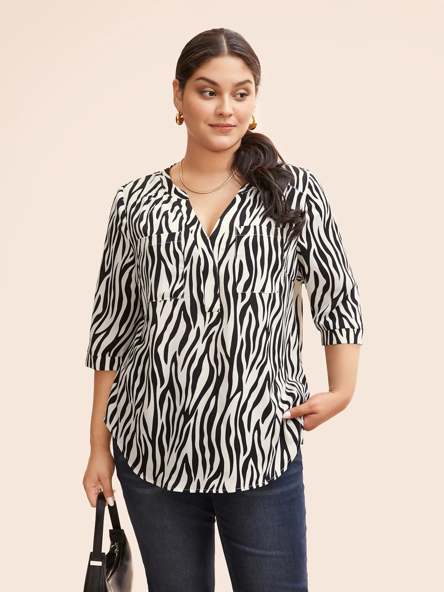 Zebra Print Notched Patched Pocket Blouse sold by Bloomchic