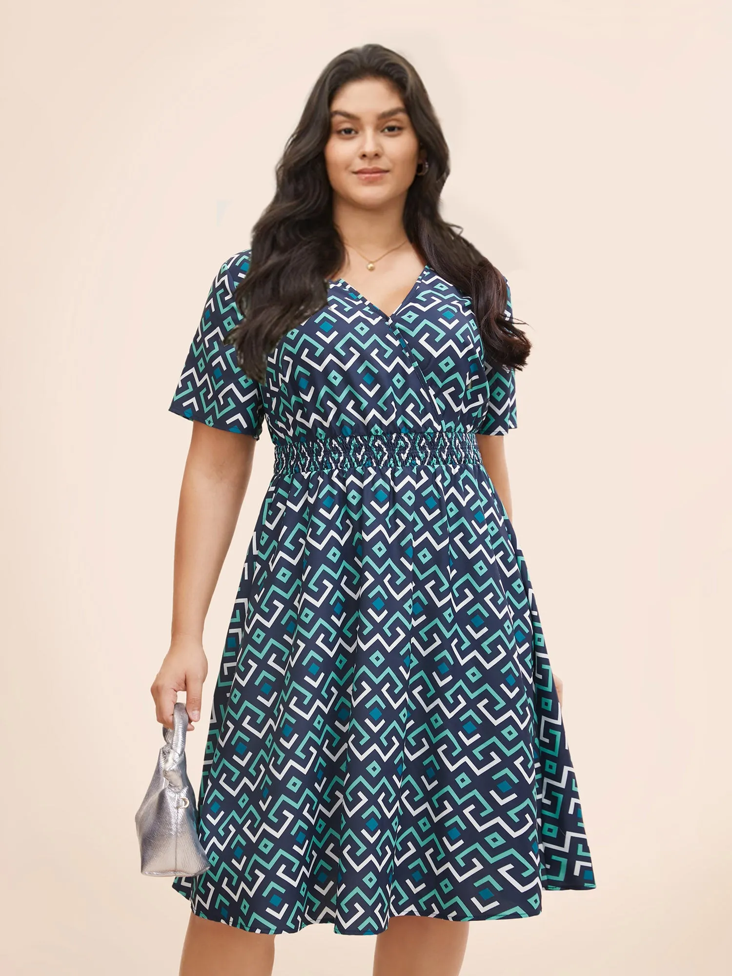 Geometric Print Overlap Collar Shirred Dress sold by Bloomchic