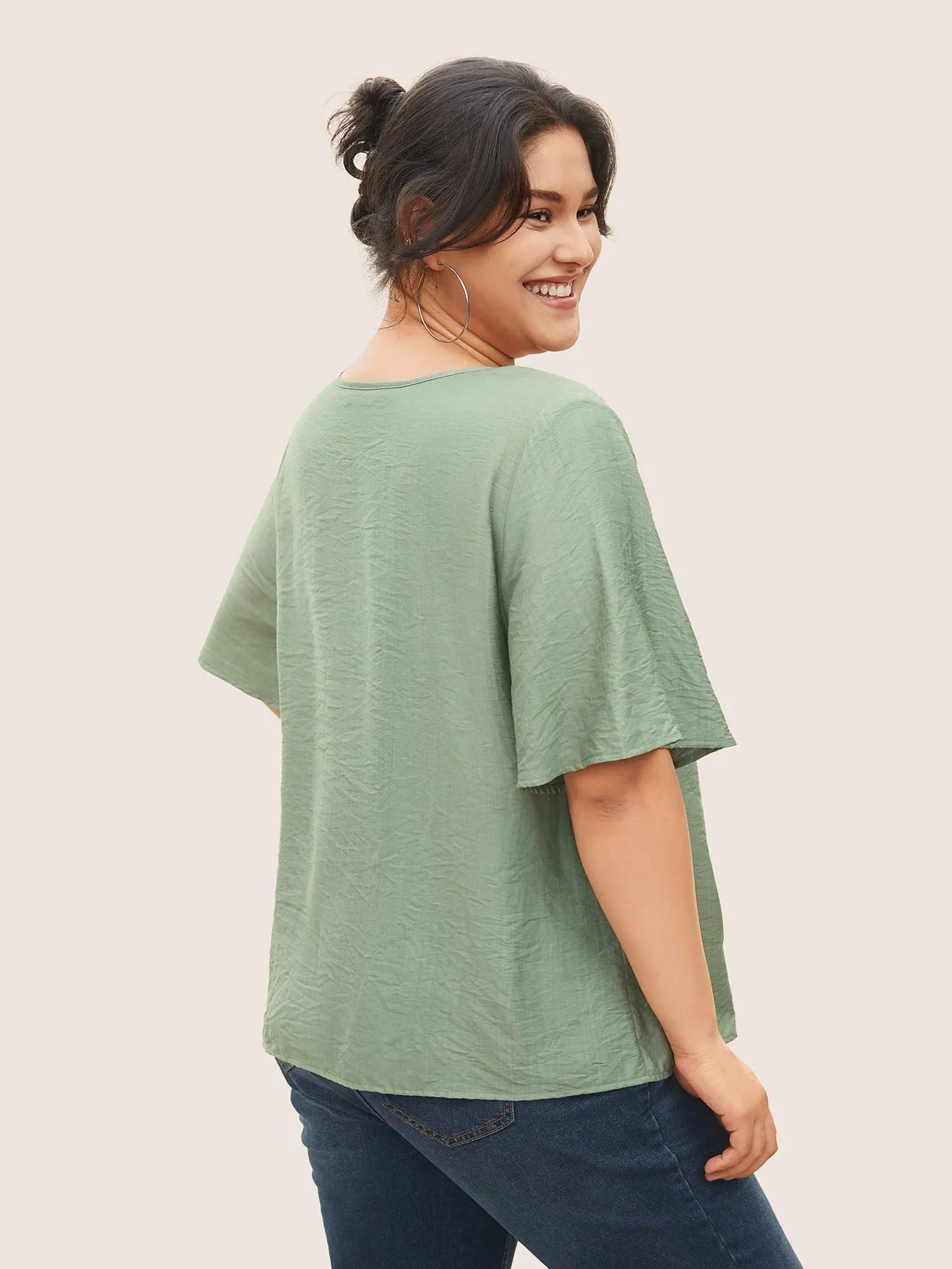 Solid Tie Knot Button Detail Ruffle Sleeve Blouse sold by Bloomchic product image thumbnail 5