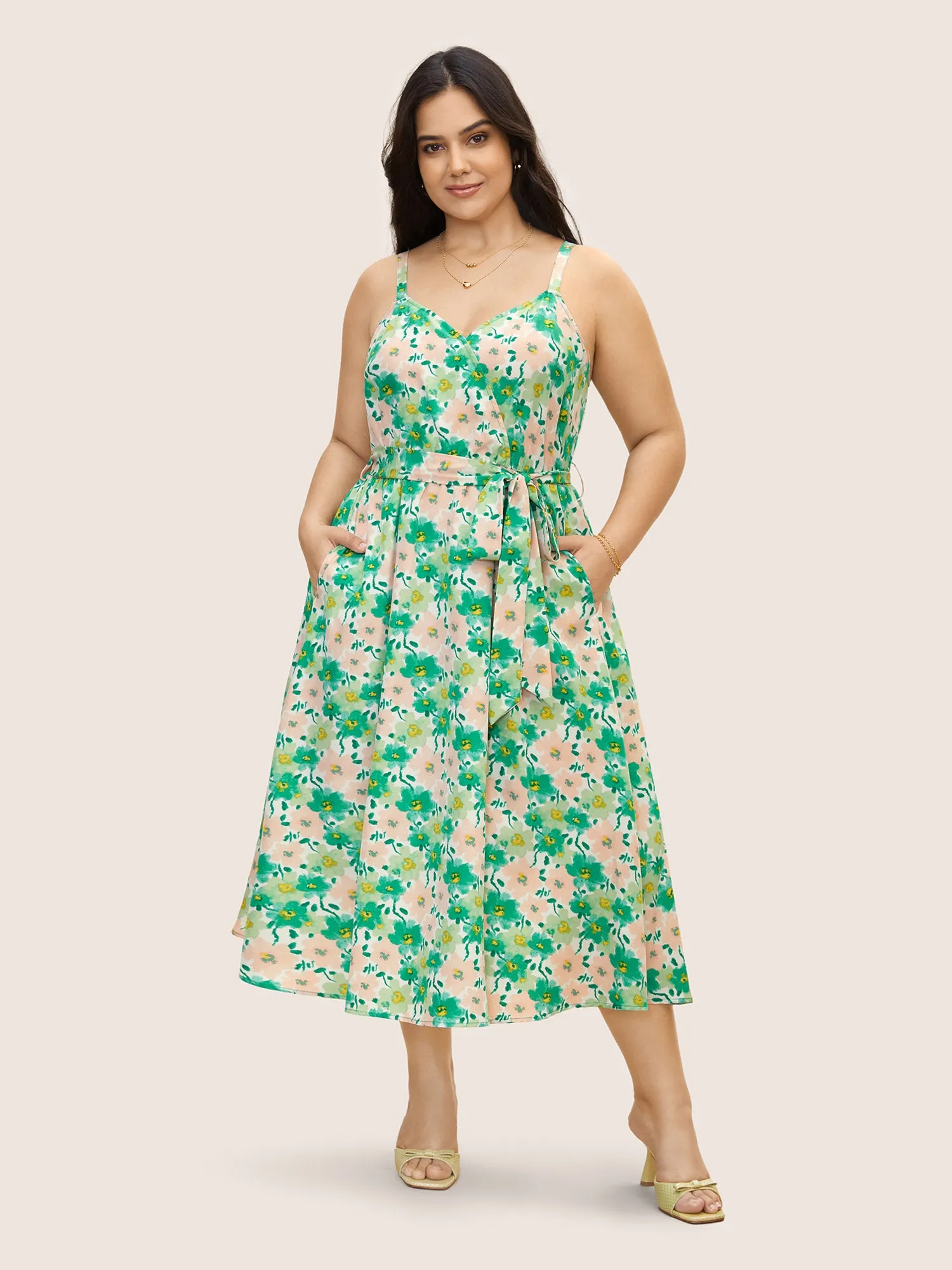 Floral Surplice Neck Belted Midi Dress sold by Bloomchic