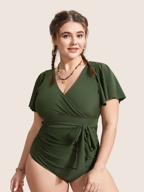 Solid Overlap Collar Ruffle Sleeve One Piece Swimsuit sold by Bloomchic
