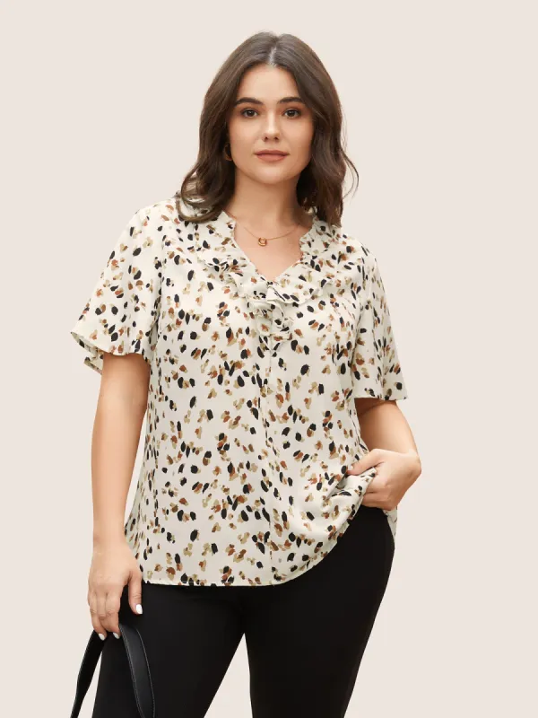 Allover Print Notched Ruffle Trim Blouse sold by Bloomchic