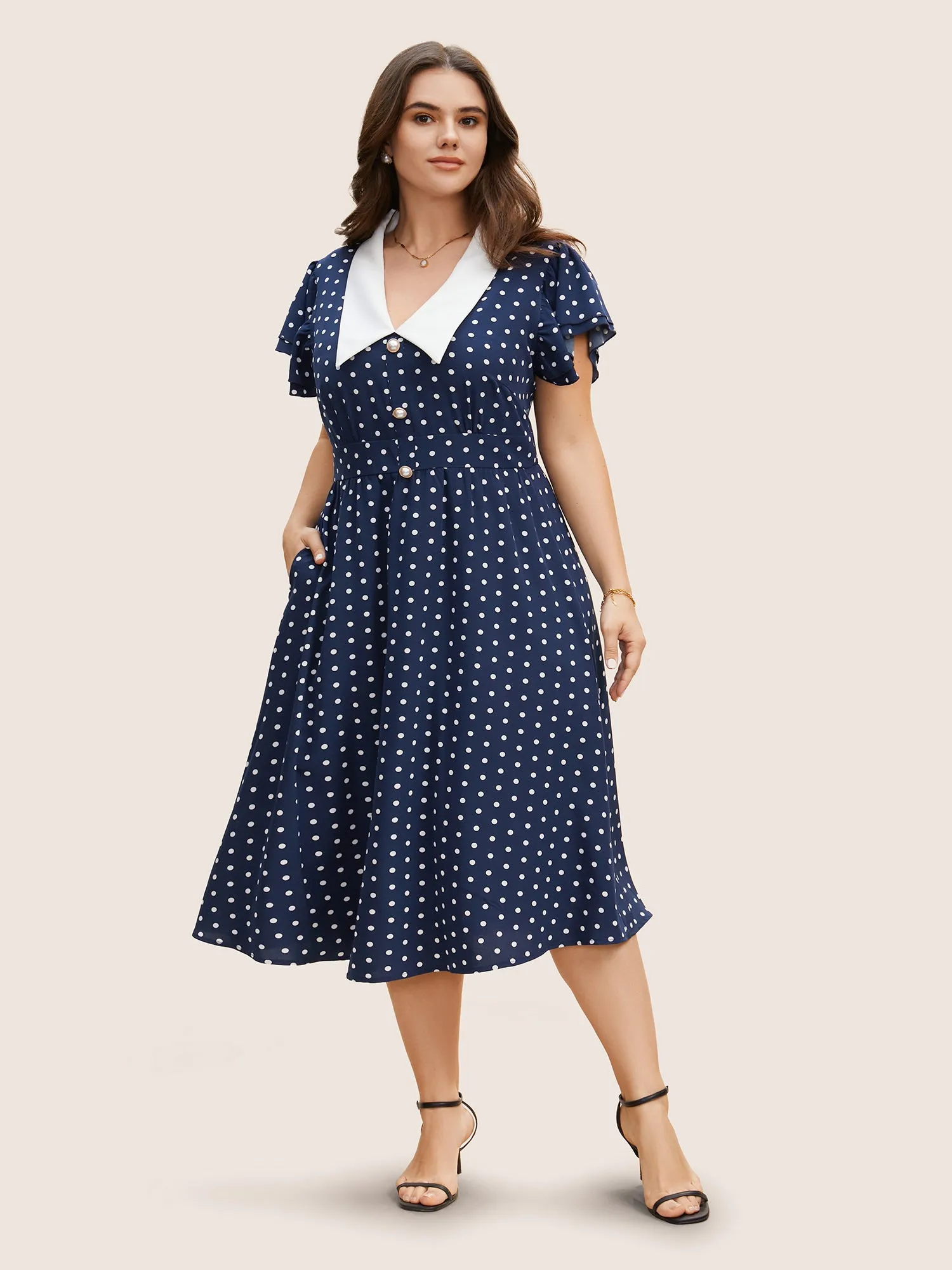 Polka Dot Ruffle Cap Sleeve Button Detail Dress sold by Bloomchic