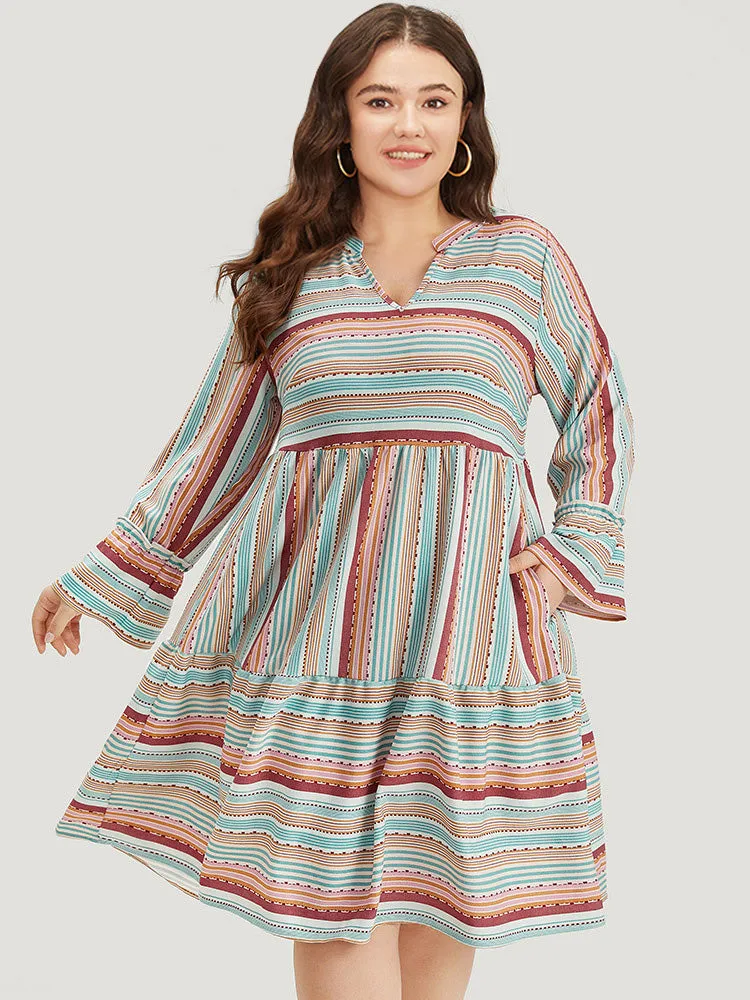 Contrast Striped Notched Layered Hem Bell Sleeve Dress sold by Bloomchic