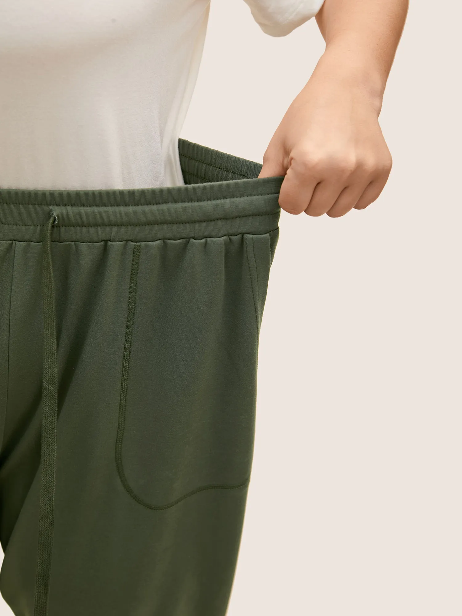 Solid Drawstring Topstitching Mid Rise Carrot Pants sold by Bloomchic product image thumbnail 3