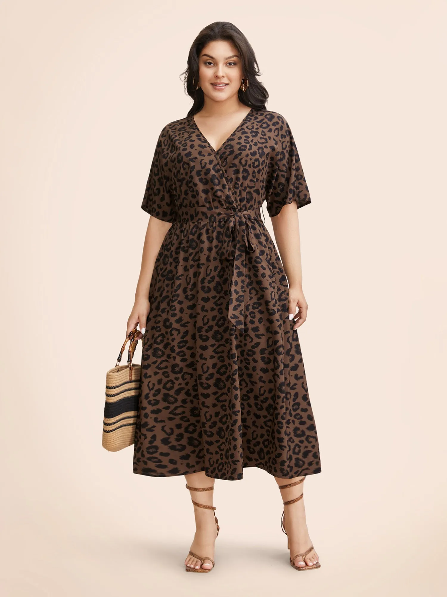 Leopard Print Split Front Dolman Sleeve Dress sold by Bloomchic