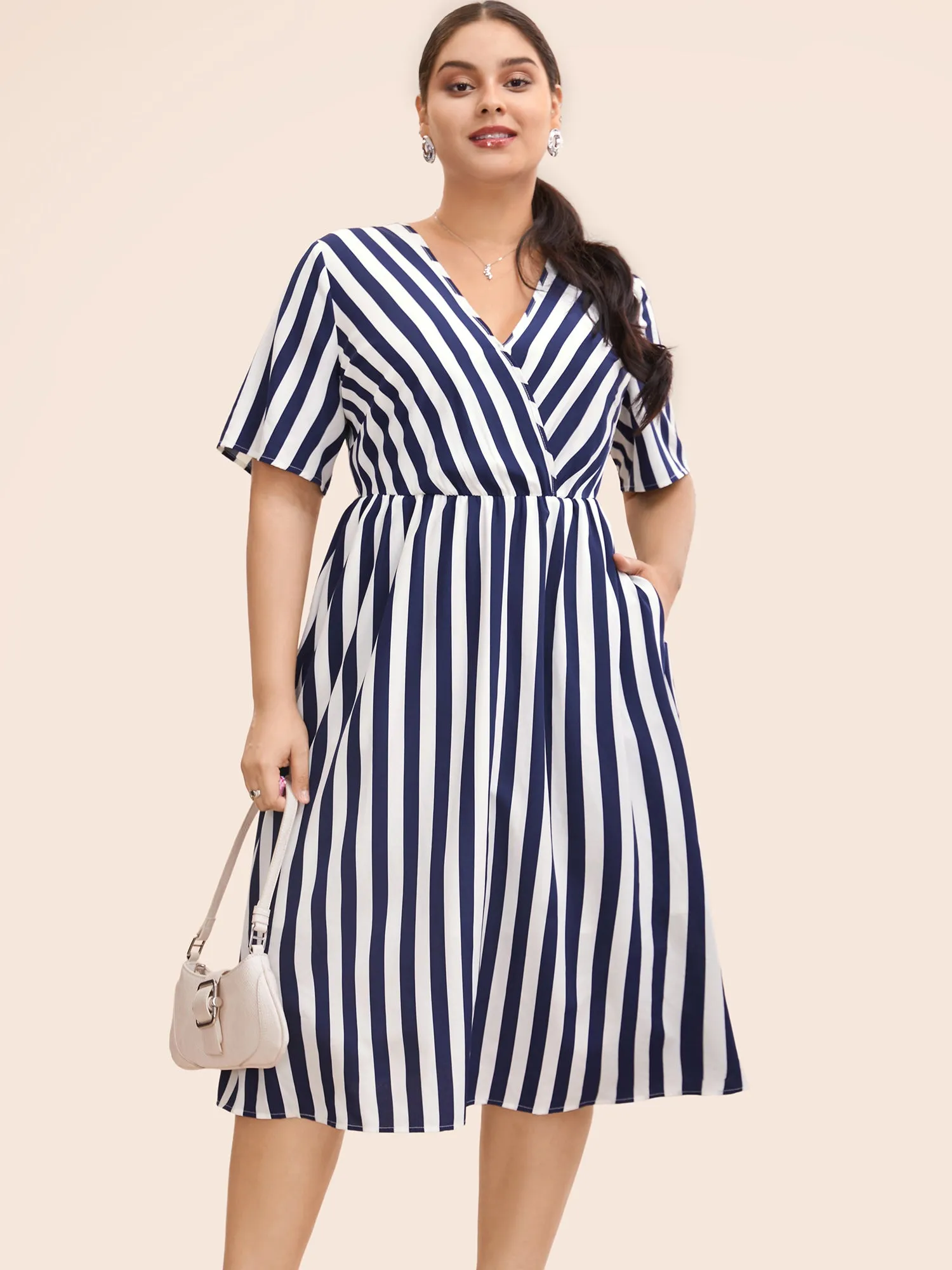 Striped Overlap Collar Ruffle Sleeve Midi Dress sold by Bloomchic