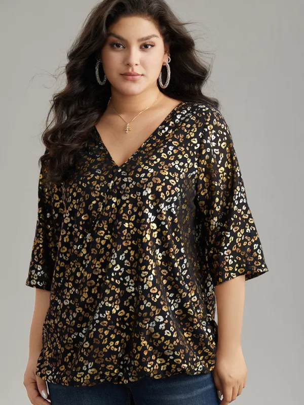 Leopard Glitter Wrap V Neck Blouse sold by Bloomchic